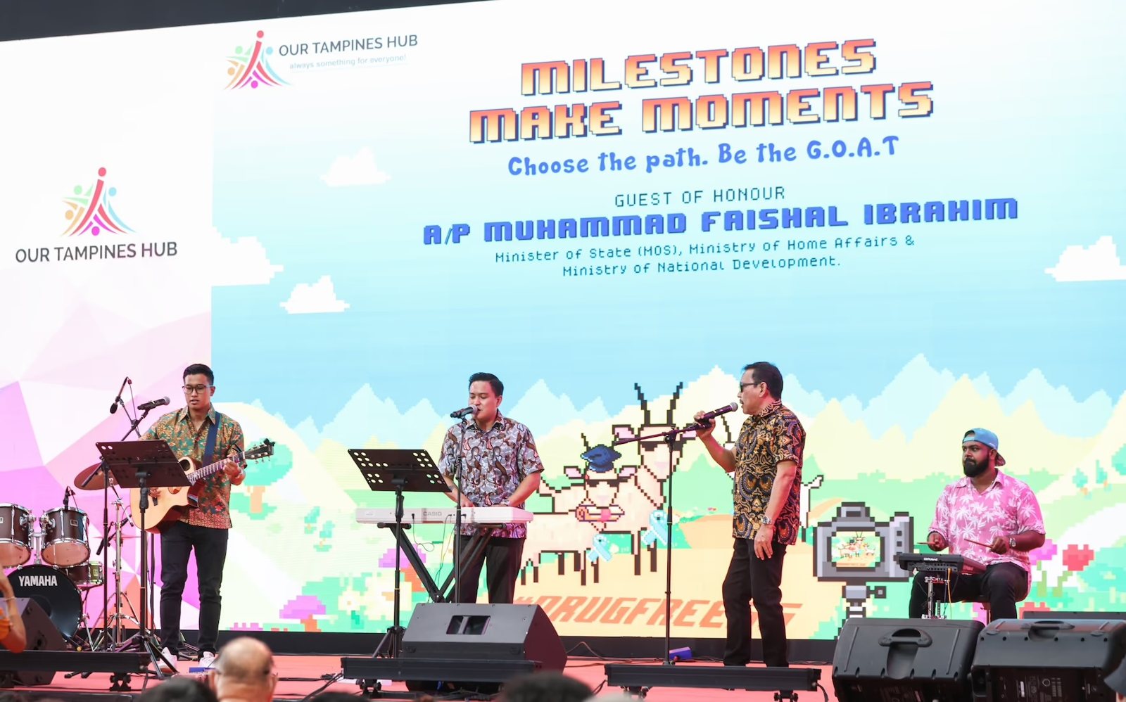 Joint performance on stage with the Guest of Honour